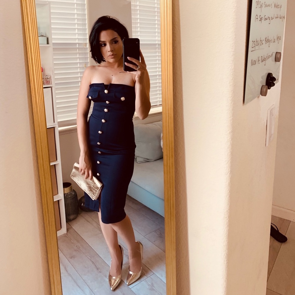Bodycon Blue midi length dress .